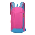 Lightweight outdoor travel backpack in pink with blue straps and orange zipper details - Mixed Pink