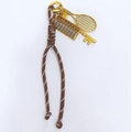Woven paracord keychain with golden tennis racket, abacus and key charms accessory - Tan