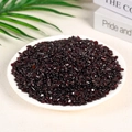Deep red garnet crushed stone crystals with smooth polished surface on a beige background - Garnet (5-7mm) 100g