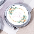 Silver round compact mirror with floral print and Not A Day Over Fabulous text - Watercolor Wreath Blessing