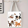 Détail du sac cabas en toile blanche avec motifs de chats brodés et anses tissées - Quatre Chats et Papillons (jiayingstd98)