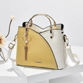 Chic yellow and cream contrast tote bag with golden handle and heart tassel detail - Yellow and White