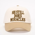 Adjustable two-tone baseball cap with 'HE STILL DOES MIRACLES' embroidery detail - Off-White/Dark Khaki
