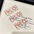 Faux ongles de Noël avec effet œil de chat, flocons de neige et strass perlés - Grand (L) / 2580 Forme Cercueil Courte