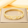 Detail of 8k gold plated stainless steel hollow geometric bangle with crystal inlay - Intertwined Chain Rhinestone Style (KB210552-KSZ)