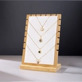 Wooden necklace display stand with white padded surface and ten hooks for jewelry - White Leather