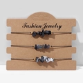 Dreiteiliges Set aus unregelmäßigen schwarzen und grauen Steinarmbändern auf Kraftkarte - FK0062 Schwarz Grau Tintenspritzer Set