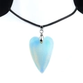 Light blue translucent heart pendant necklace on white mannequin with black cord strap - Opal (Synthetic)