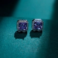Elegant purple square cut zircon stud earrings with silver halo setting on dark green base - Square Violet Zirconia Studs