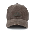 Close-up of brown washed cotton baseball cap with mountain patch and distressed details - Adjustable / Coffee