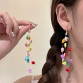 Detailed macro view of colorful star beads and long tassels on these fairy-style earrings - 8# Colorful Pentagram Tassel (Silver Pin)
