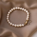 Natural freshwater pearl bracelet with gold magnetic clasp on champagne silk background - Champagne Pearl Bracelet with Magnetic Clasp (L-c-020)