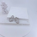 Micro-paved clover earrings in silver finish on white stone with angel statue - Silver Four-Leaf Clover