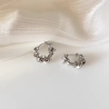 Modern twisted hoop earrings in polished silver finish for a minimalist chic look - Silver Spiral Ear Buckle