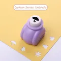 Purple manual paper punch for DIY crafts with a cute umbrella pattern and yellow cardstock - Cartoon Series: Umbrella
