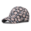 Detalle de gorra de béisbol floral con estampado de hibisco y costuras en la visera - Pequeño Floral Beige