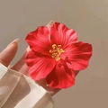 Vibrant red hibiscus flower hair clip with realistic petals and yellow stamen - Red Hibiscus Hair Clip