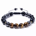 Detail view of 10mm blue tiger eye and black onyx beads on adjustable woven bracelet - Yellow Tiger Eye + Black Agate + Hematite