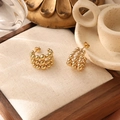 Macro shot of gold beaded hoop earrings on linen texture background with warm lighting - Multilayer Beaded Hoop (ZHE488金)