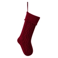 Burgundy knitted Christmas stocking with heart patterns, cable stitch, and fringe tassels - Fuschia