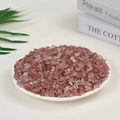 Polished pink strawberry quartz crystal stones displayed in a white ceramic dish - Strawberry Quartz (5-7mm) 100g