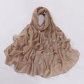 Detailed view of brown chiffon hijab with elegant floral pearls and rhinestone embellishments - 175x70cm / Camel