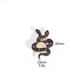 Detail of black enamel snake brooch with gold celestial sun and moon patterns - Cosmos Snake Style (M164#8)
