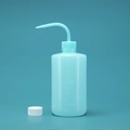 Light blue plastic wash bottle with curved nozzle and white cap for precise plant watering - 500ml (Blue with Extra Cap)