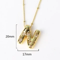 Detailed view of gold letter N pendant with rhinestones measuring 20mm by 17mm - Letter N(XED218)
