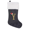 Detail of grey velvet Christmas stocking featuring a golden embroidered letter Y and faux fur - Letter Y