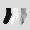 Three-pack of athletic crew socks in black, white, and grey with ribbed anti-slip cuffs - Single Elastic Crew Socks / Black White Grey Mix