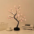 Pink LED cherry blossom tree lamp with black trunk and circular base for decor - 108L Silver Branch Pink Light (Dual Use)