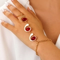 Detail of vintage bohemian gold finger bracelet with spiral red oval gemstones - Gold Red Bead Style (9926)