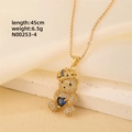 Detail of bear pendant with blue heart gem and white crystals on 45cm gold chain necklace - Gold - Crown Blue Heart Bear