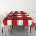 Detailed view of red and white buffalo plaid Christmas tablecloth in a home dining setting - 140x200cm / Red and White Buffalo Plaid