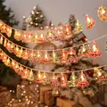 Christmas LED fairy lights featuring warm yellow Santa and tree ornaments for festive decor - Printed Hollow Mixed Battery 1.5m 10LED