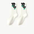 White crew socks featuring minimalist cute floral pattern in soft combed cotton - White With Black Flowers