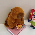 Brown plush Capybara backpack featuring a cute hamburger charm and soft fuzzy straps - 35cm / Hamburger Capybara