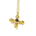 Close-up of gold cross pendant necklace featuring a polished black natural stone center - Gold Black Cat Eye Stone