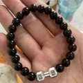Volcano stone bead bracelet featuring black obsidian beads and silver metal dumbbell charm - Glossy Black Dumbbell Silver
