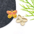 Detailed front and back view of orange enamel butterfly pendant with golden texture - Drip Oil Yellow Flower Butterfly