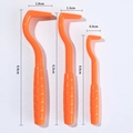 Set of 3 orange plastic pet tick removers with non-slip handles in various sizes - Three-Piece Set / Orange