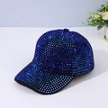 Detailed view of handmade sparkling rhinestones on a shimmering blue baseball cap - Adjustable / Blue
