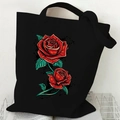 Black canvas tote bag with elegant red rose floral print and top handle design - Single Red Rose (Black)