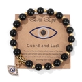 Détail du bracelet Evil Eye sur carte cadeau avec perles noires et accents dorés élégants - 19cm / Noir Brillant