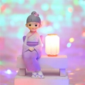 Vintage girl figurine in purple kimono sitting on bench with glowing warm lantern - Style 1136-6 Purple Light