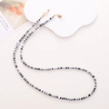 Detail of beaded glasses chain with white LOVE letter beads and secure metal clips - Black Polymer Clay LOVE Style (K2405)