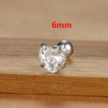 Detailed macro view of a 6mm heart-shaped cubic zirconia stud earring with silver base - 6mm Silver Tone White Style (E1611)