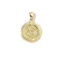 Close-up of a 18k gold-plated Taurus zodiac charm with textured metal finish and cubic zirconia - Taurus