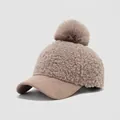 Close-up of khaki lamb wool baseball cap with faux fur pom-pom and suede brim for kids - 54cm (3-8 Years) / Fur Ball Style / Brown